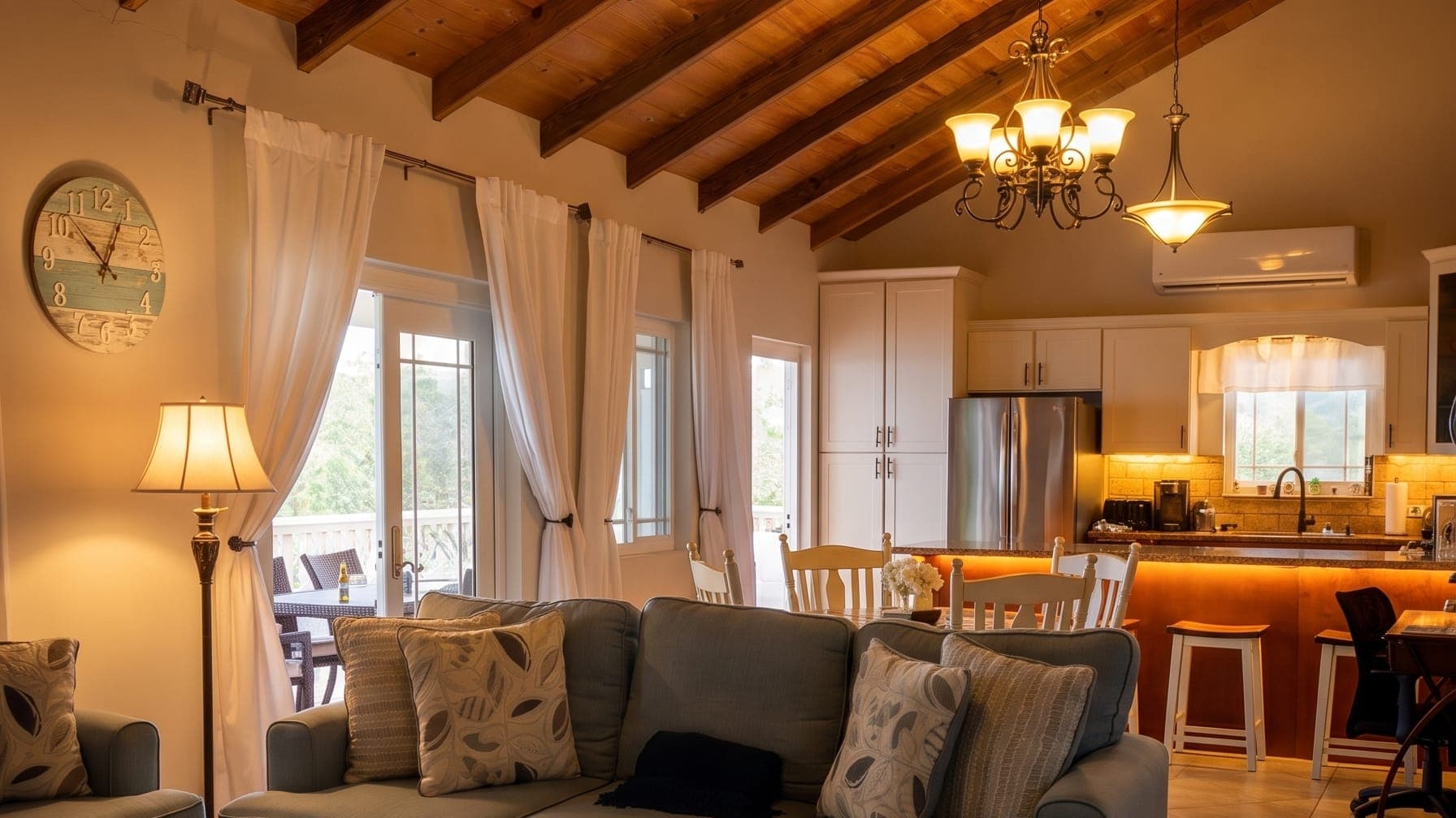 Living room of an apartment under a timber cathedral ceiling