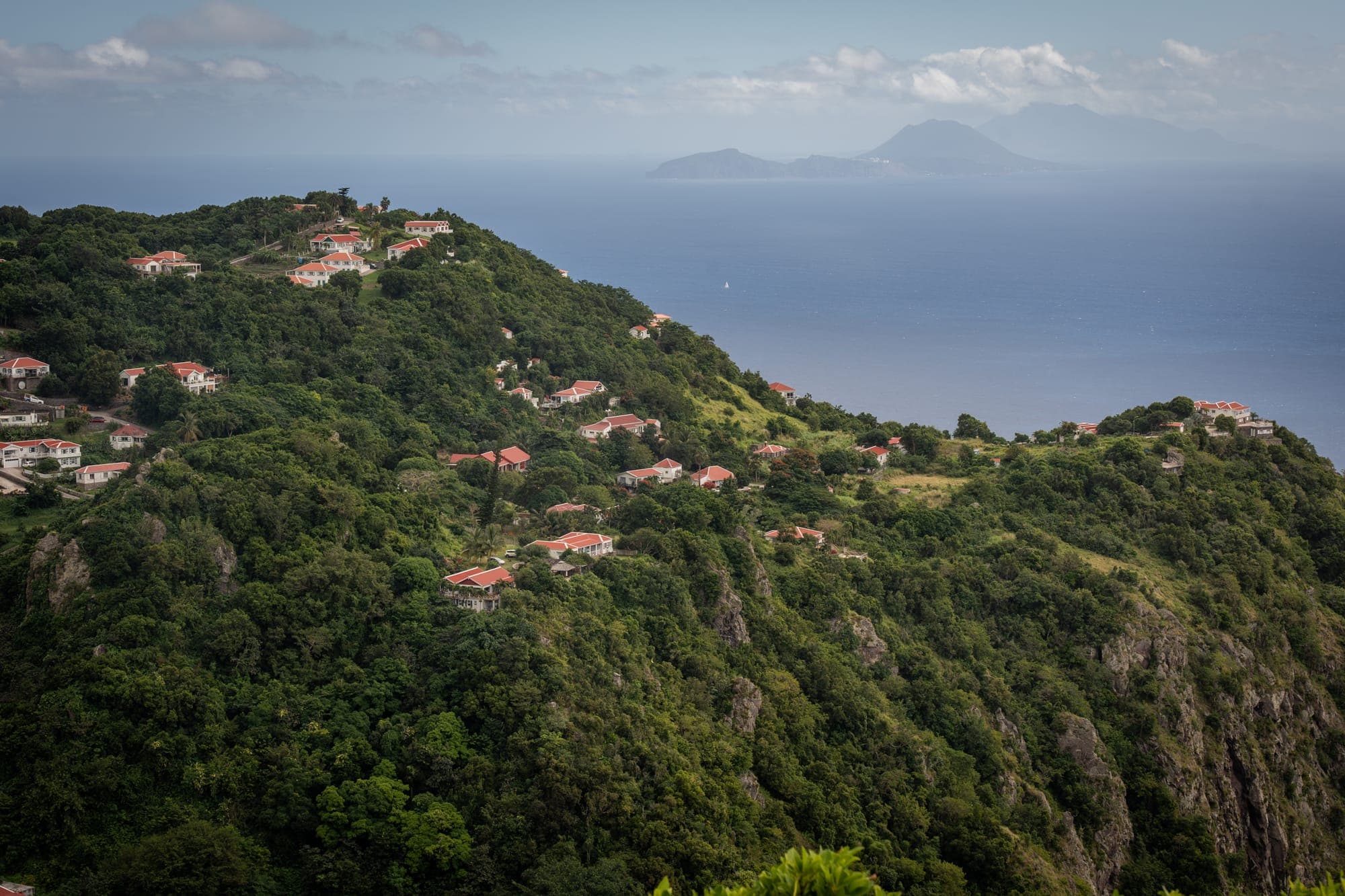 Green ridges of Saba with neighbouring islands on the horizon