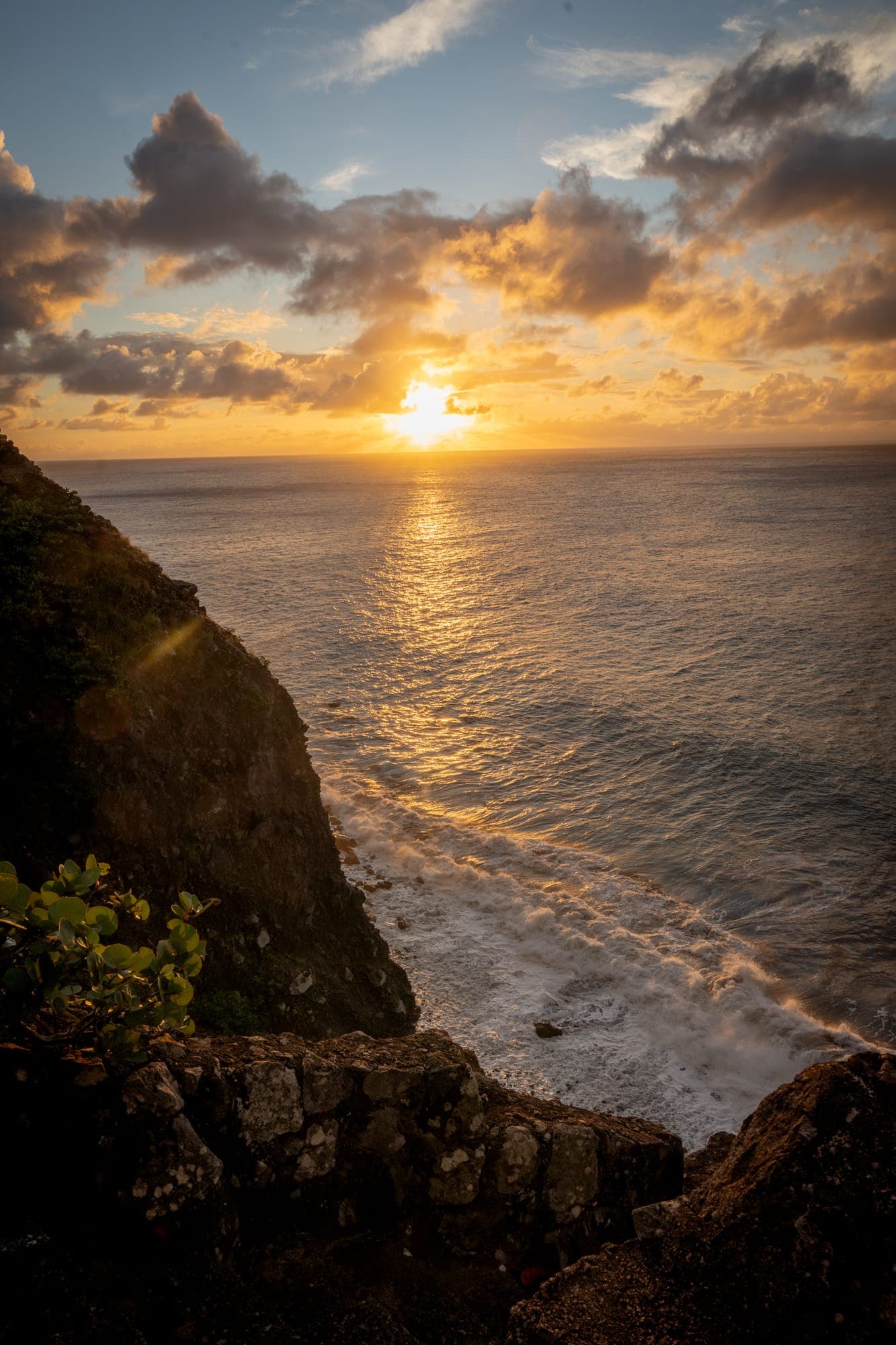 The sun setting over the sea from the cliffs of Saba